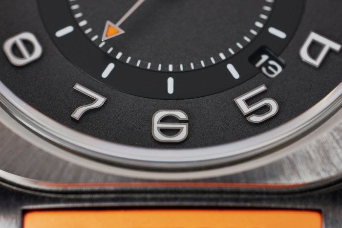A close-up of the applied numerals and date window on the H08. A close-up of the applied numerals and date window on the H08.