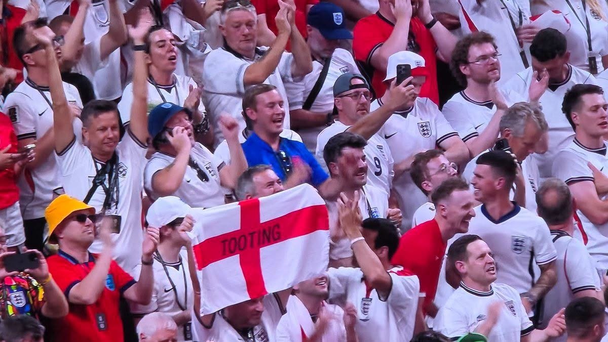 May be an image of football, crowd and text