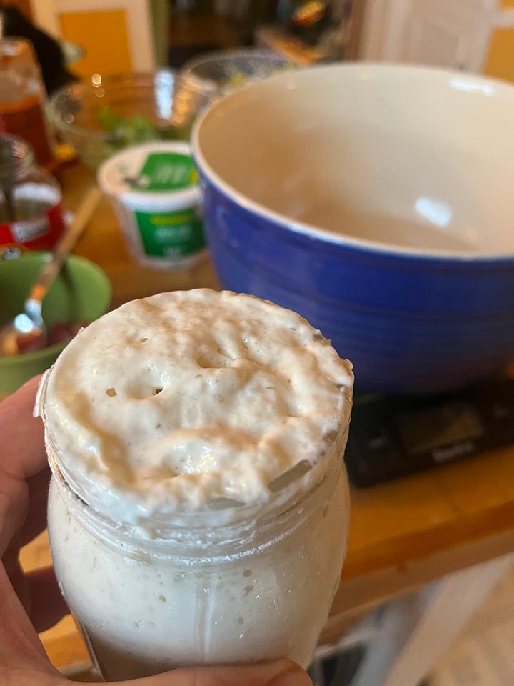 four images: 1 a jar of bubbly sourdough starter, 2 a tub of risen sourdough, 3, a loaf of bread on a cutting board, 4 the same loaf cut into pieces