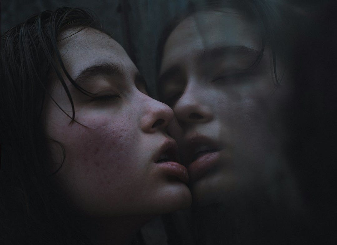 a couple of people that are kissing each other