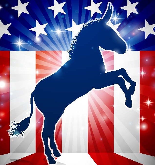 Alt text: A blue donkey rearing as if to take flight with American flag motif in the background. Alt text: A blue donkey rearing as if to take flight with American flag motif in the background.