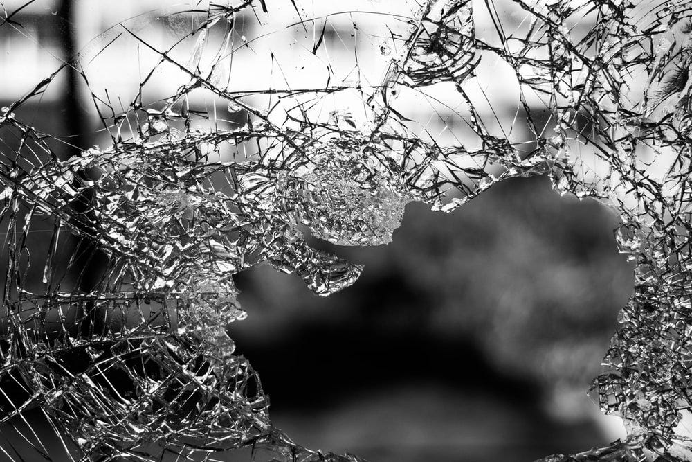 macrophotography of cracked glass screen macrophotography of cracked glass screen