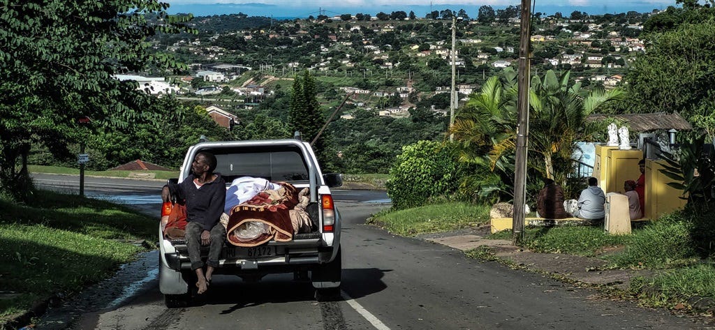 KZN floods: KwaNdengezi father carries son's body for 10km, joins sea of  families desperate for help | News24