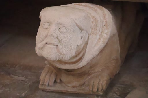 Sculpted head of a man with a moustache