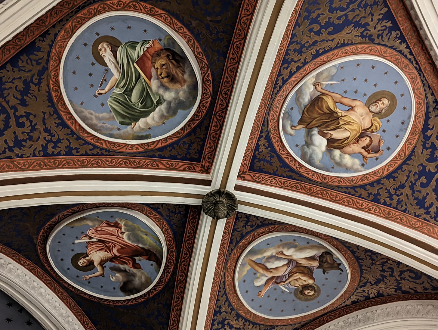 The four images in the ceiling near the main altar of the Cathedral of Cubao