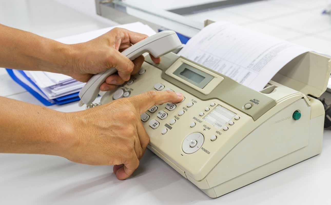 How Fax Machines Work & How to Fax in 2024 | Ooma