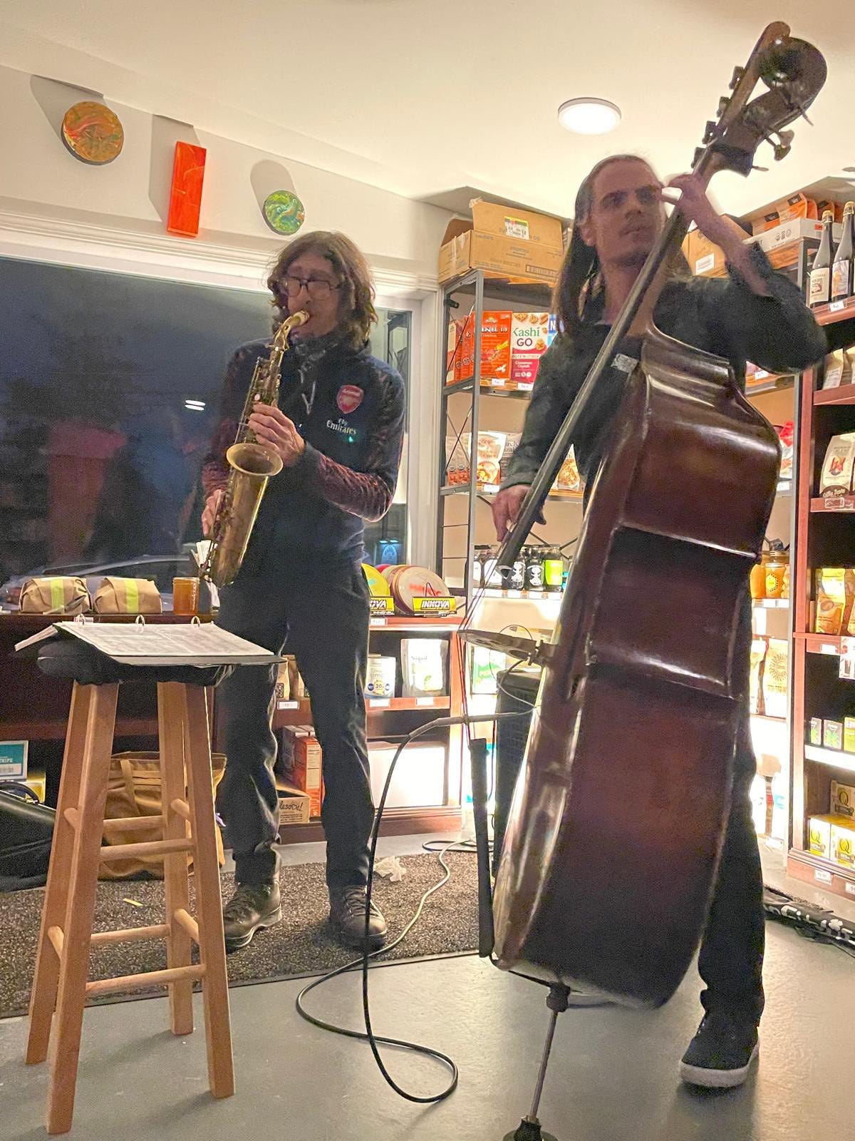 May be an image of clarinet, saxophone and guitar