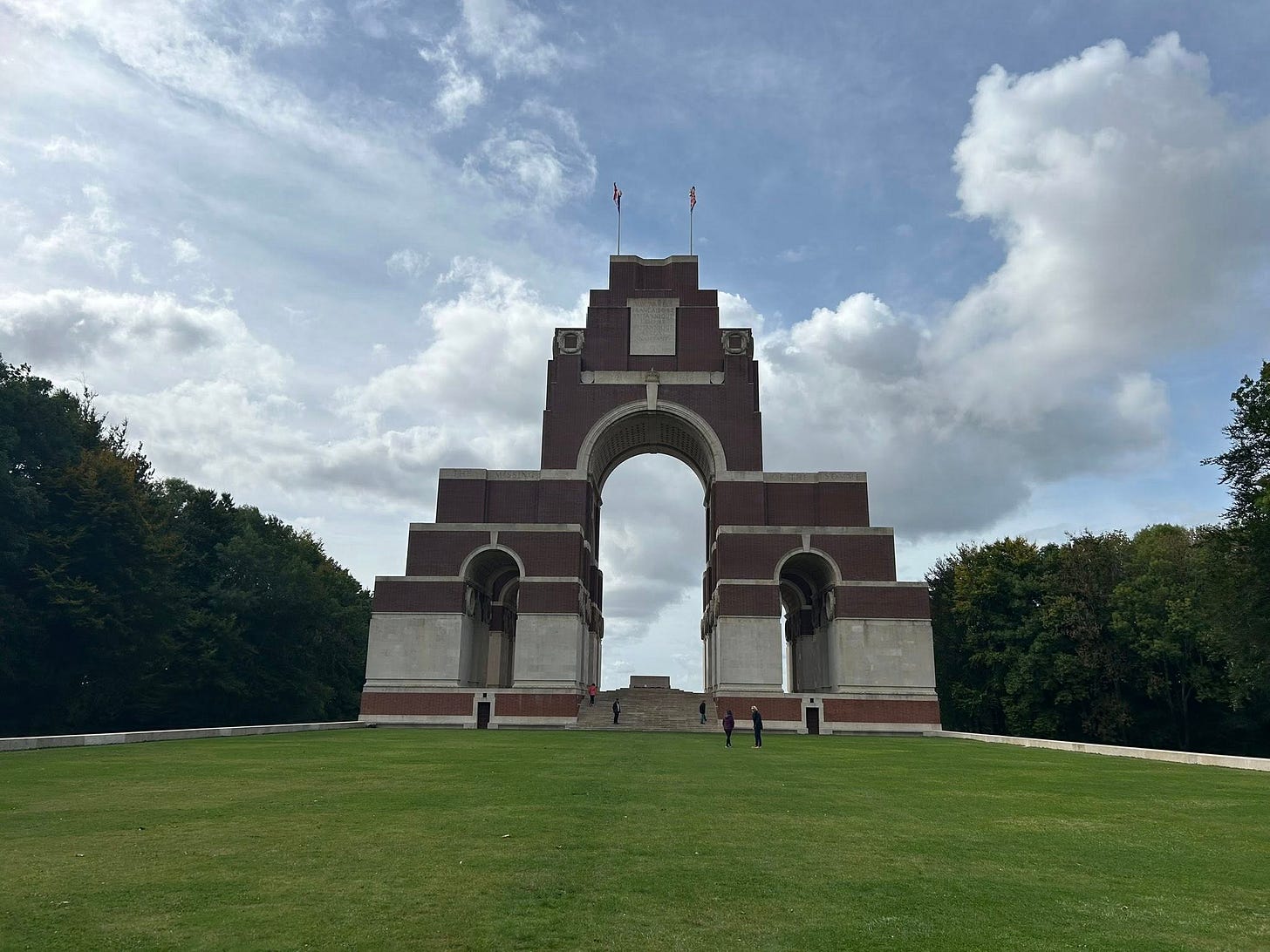 May be an image of 1 person and monument