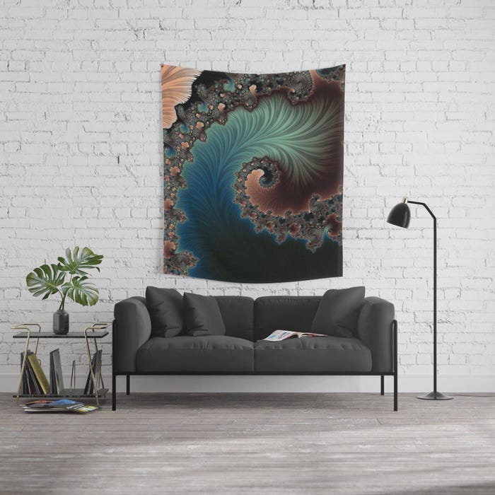 A tapestry with a spiral hangs above a couch in a living room.