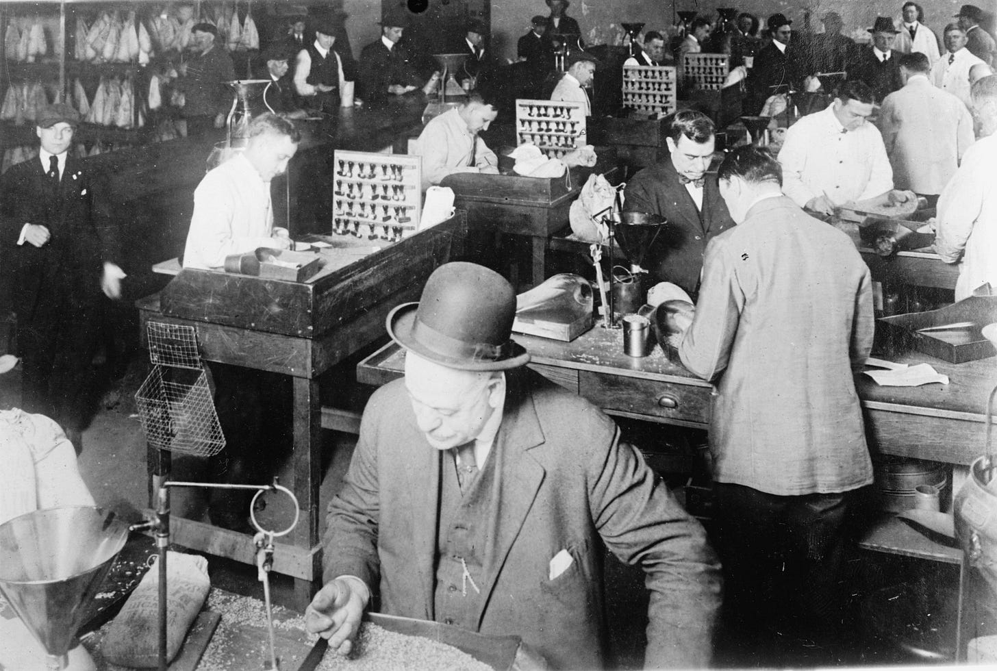 A crowded grading office c. 1909-1920