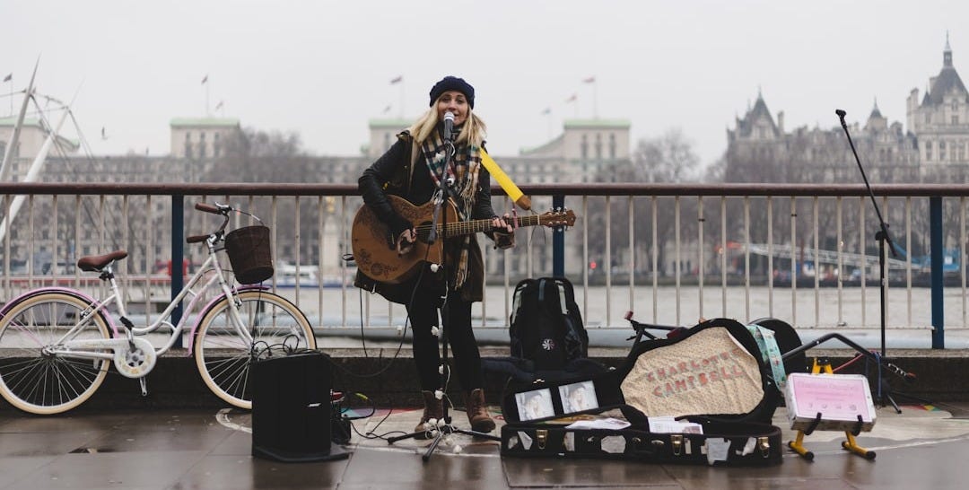 woman playing guitar