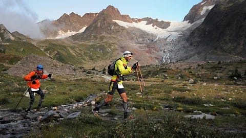 Getty Images Two trail runners cross an alpine valley beneath a glacier during an ultramarathon in the Alps (Credit: Getty Images) Getty Images Two trail runners cross an alpine valley beneath a glacier during an ultramarathon in the Alps (Credit: Getty Images)