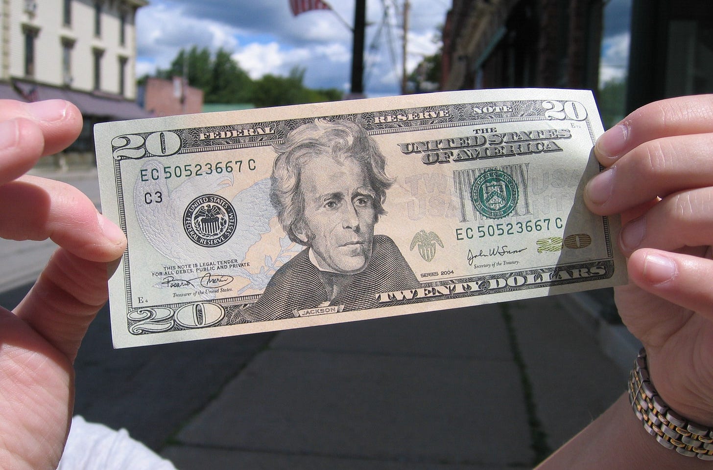 a $20 bill with a slaver and ethnic cleanser on it a $20 bill with a slaver and ethnic cleanser on it