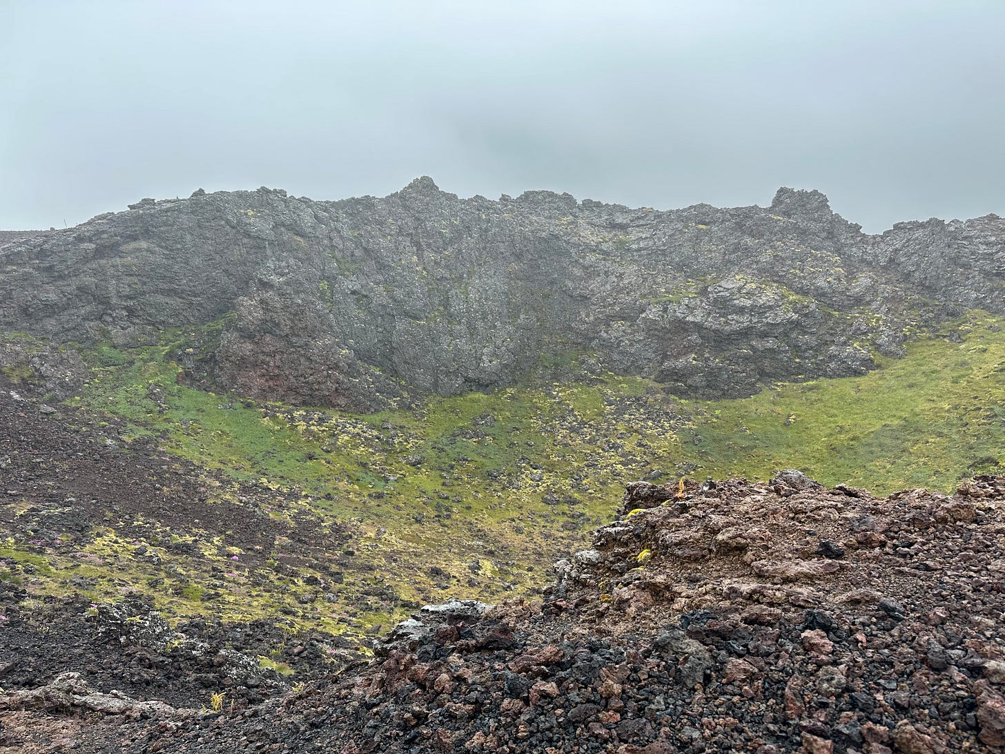 Eldborg Crater view from the top in rain and fog