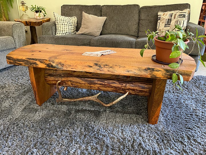 tables made of wood and deer antlers