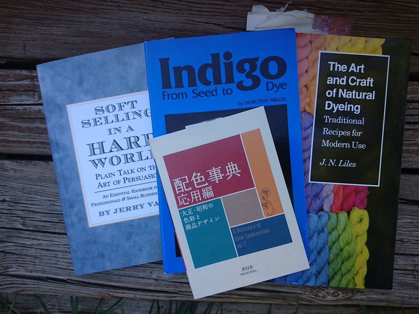 A top down view of the first four books mentioned
