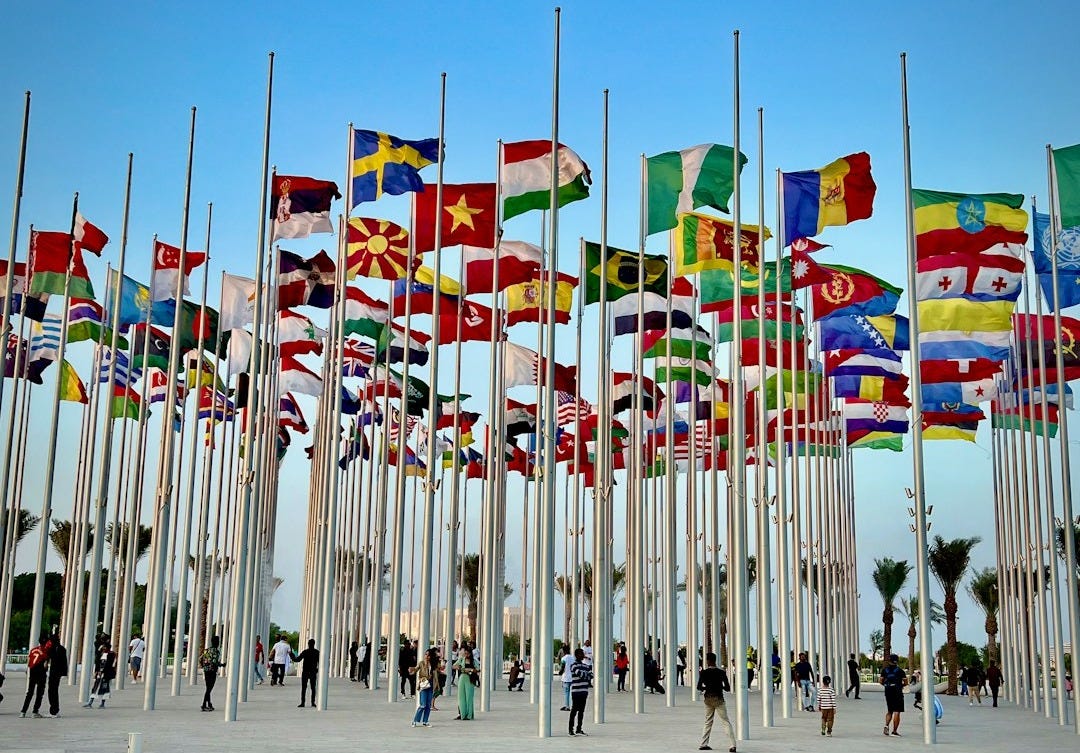 a bunch of flags that are next to each other a bunch of flags that are next to each other