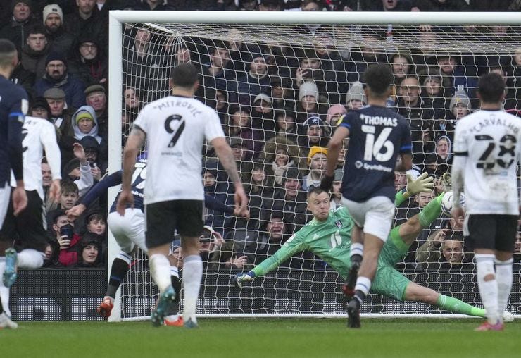 Holmes slotted home a penalty to wrap up the points for Huddersfield.