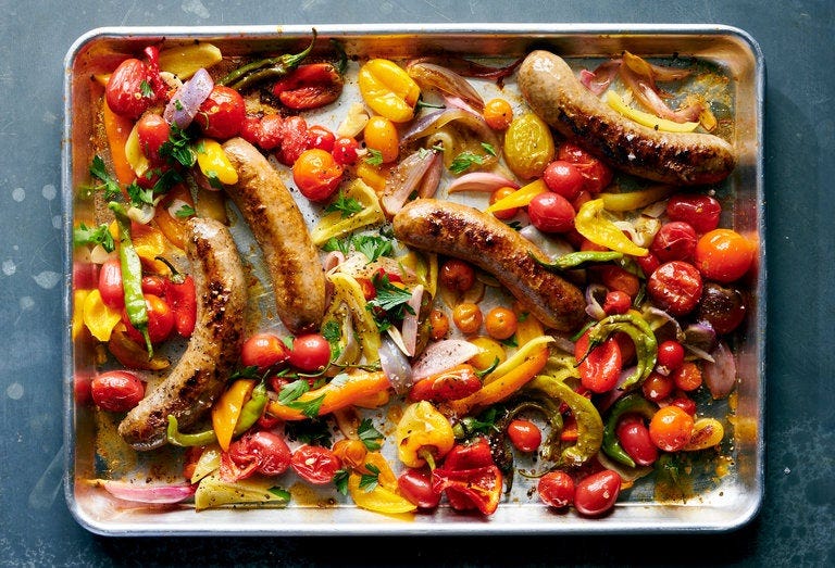 Sheet-Pan Sausage With Peppers and Tomatoes