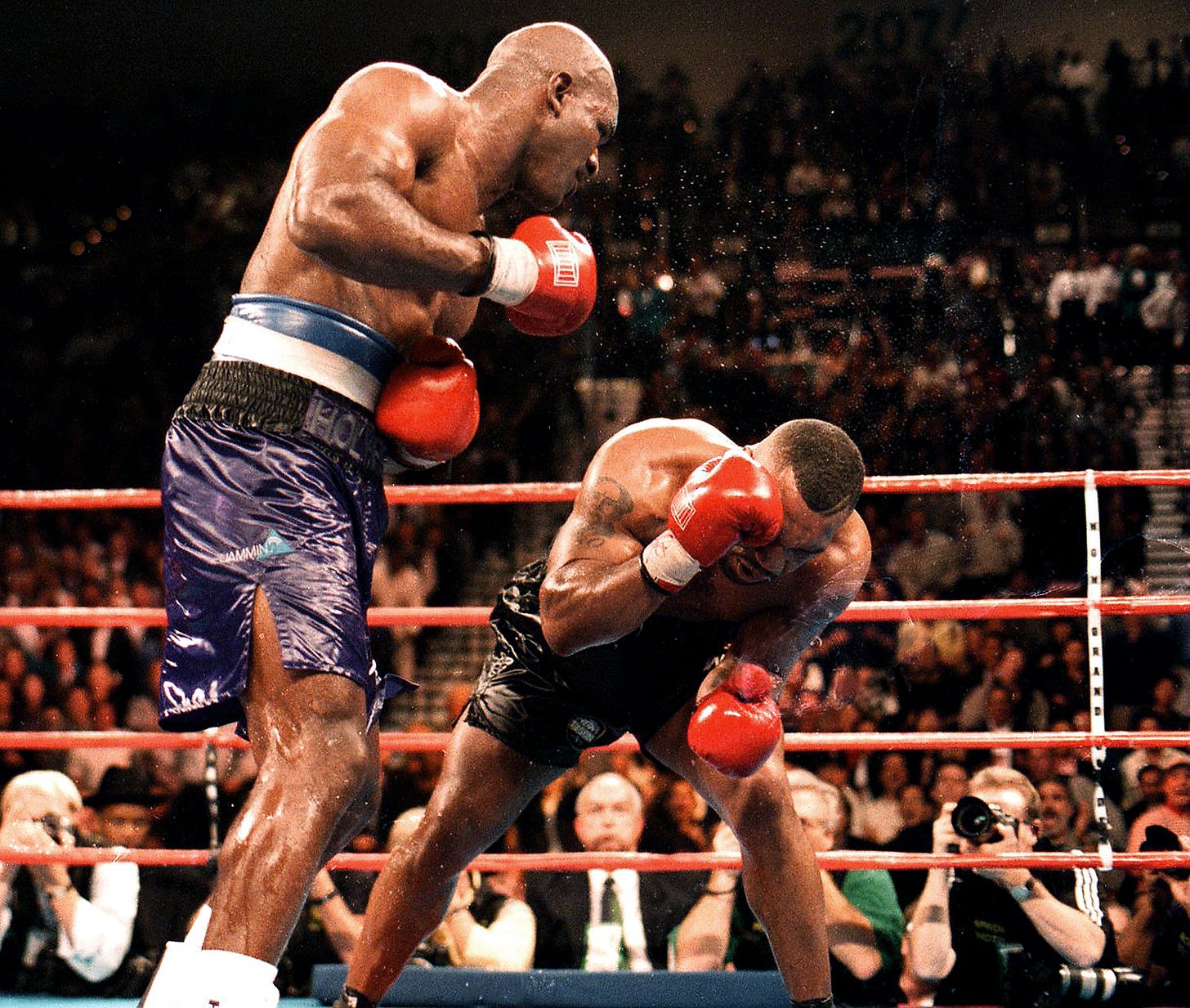 Holyfield vs Tyson I: "The Real Deal" Humbles "Iron Mike"