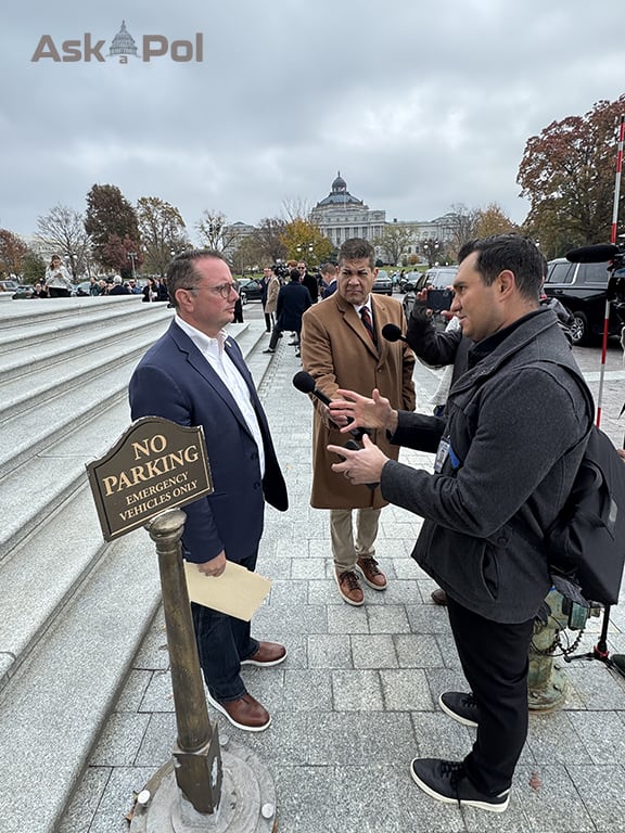 A No Parking sits next to a Congressman taking questions from reporters and their camera crews. Photo: Matt Laslo www.askapol.com