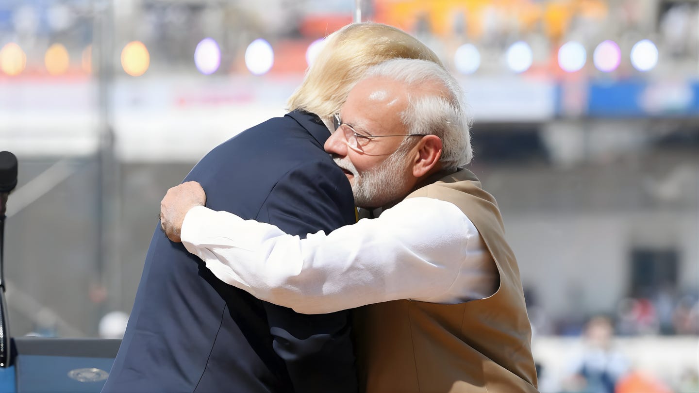 Narendra Modi hugging Donald Trump Narendra Modi hugging Donald Trump