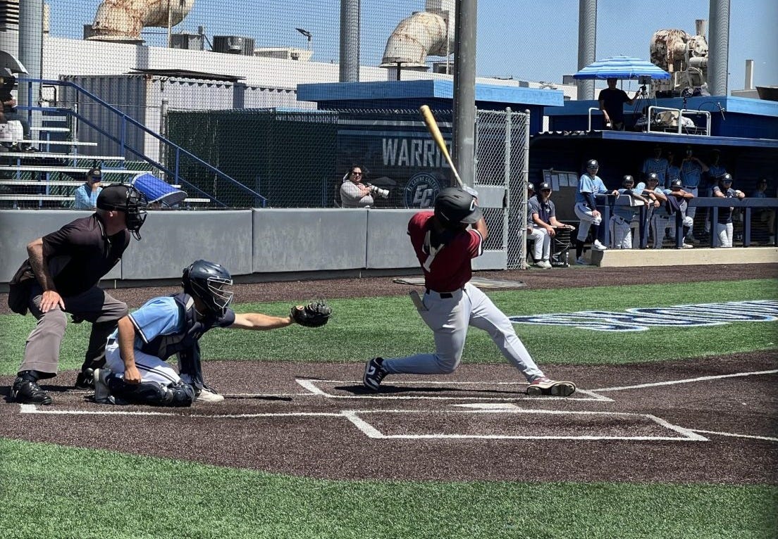 Compton College infielder Corey Guy hits the ball during the game on Saturday, April 5. The Warriors won 14-1. (Jamila Zaki | The Union)