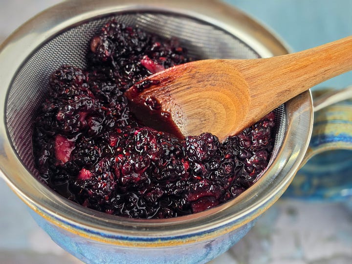 steps for making the blackberry coulis by combining, muddling, and straining blackberries, sugar, and salt