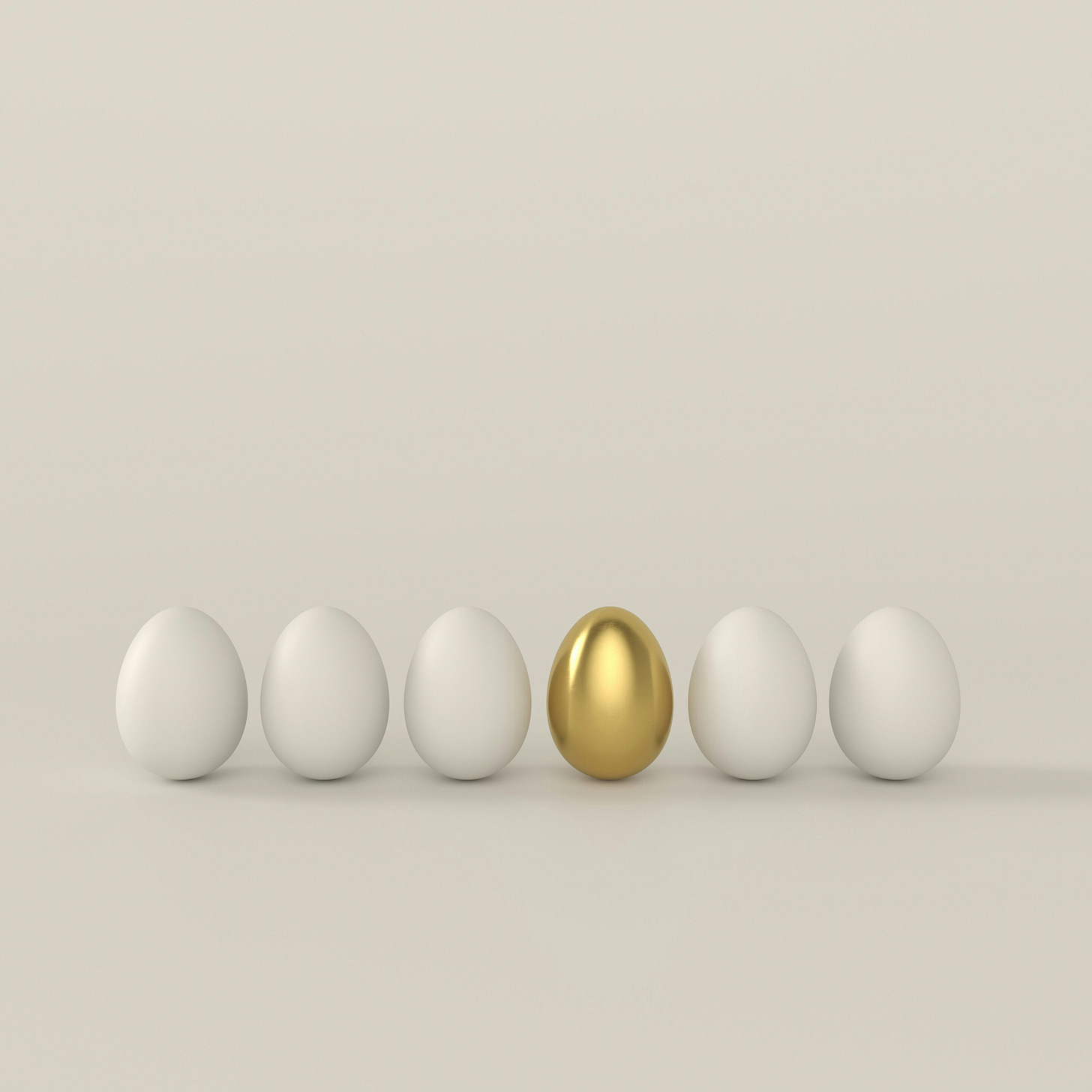 white eggs in row with one gold egg white eggs in row with one gold egg