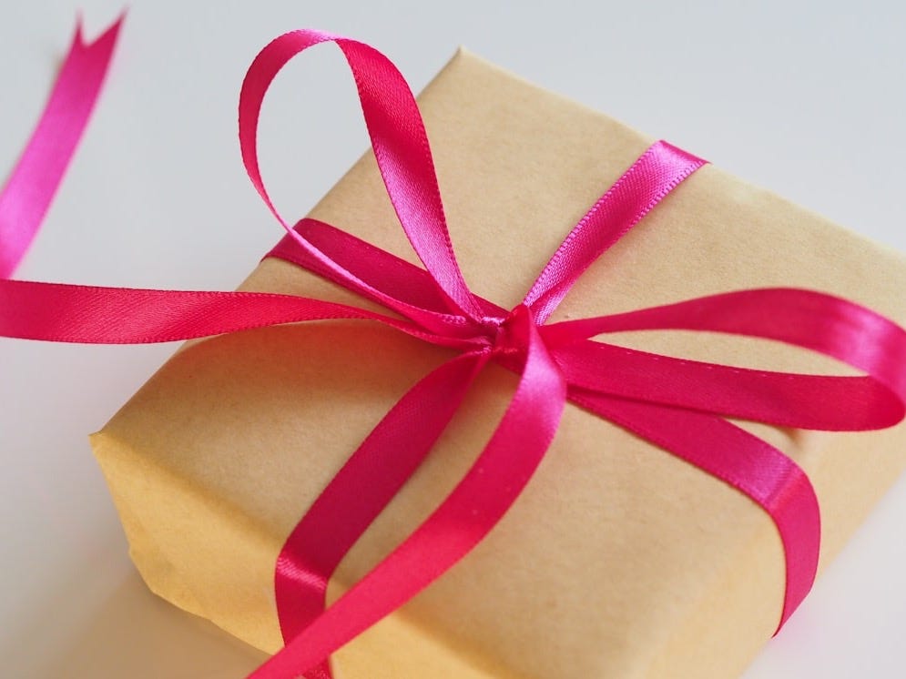 brown gift box with pink ribbon brown gift box with pink ribbon