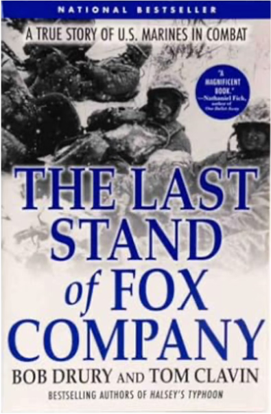 Book cover for The Last Stand of Fox Company written in bold blue text across the center of the image with the authors Bob Drury and Tom Clavin listed at the bottom. The upper half of the cover depicts snow covered Marines in their cold weather equipment reclined on the ground resting with the image fading to snowy white in the bottom portion of the cover. Across the top is “A True Story of U.S. Marines In Combat”