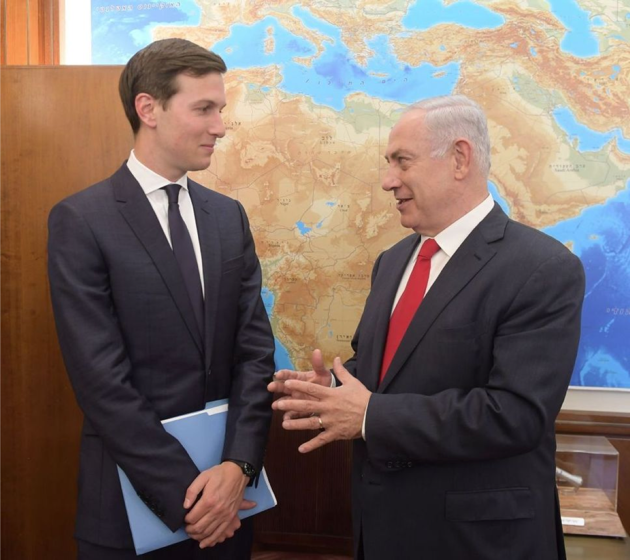 Netanyahu and Jared Kushner before a map: where whispered strategy becomes statecraft.