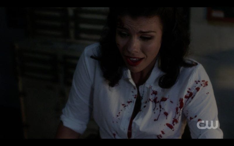 sarah troyer on supernatural tombstone splattered with blood