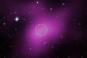 Magenta is radio data from the ground-based Very Large Array (VLA) showing the presence of Cloud-9. The dashed circle marks an area where researchers focused their search for stars. Hubble found no stars within Cloud-9. The few objects within its boundaries are background galaxies. Magenta is radio data from the ground-based Very Large Array (VLA) showing the presence of Cloud-9. The dashed circle marks an area where researchers focused their search for stars. Hubble found no stars within Cloud-9. The few objects within its boundaries are background galaxies.