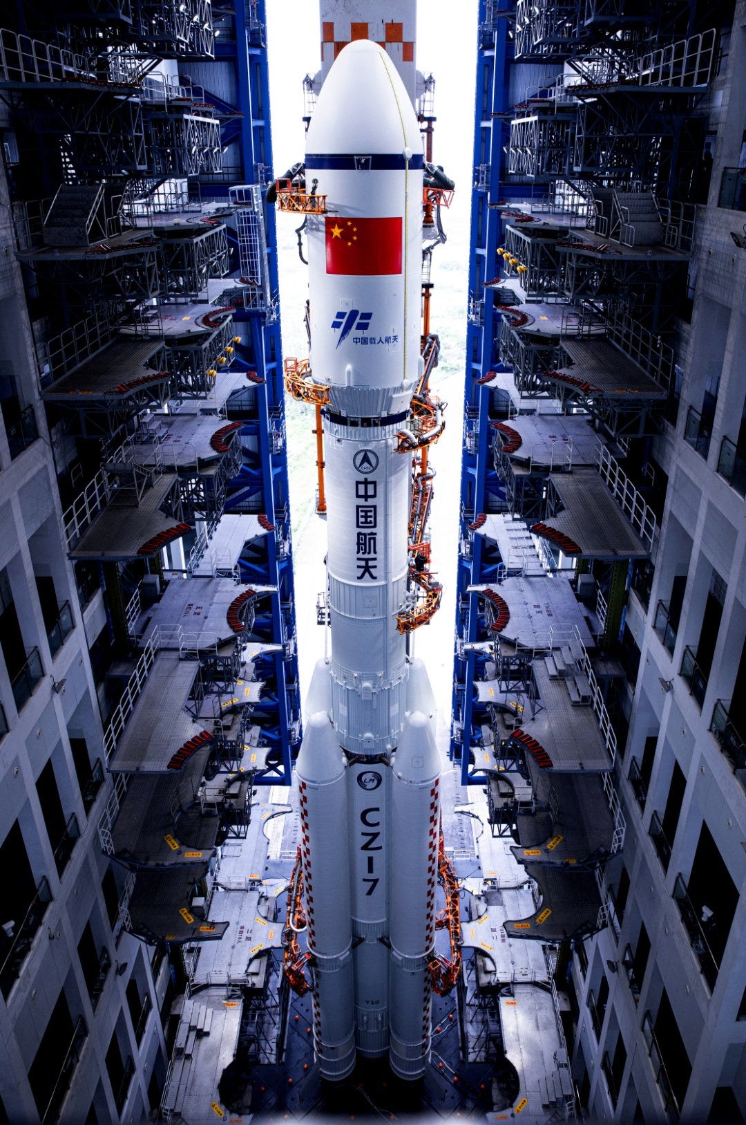 The Long March 7 Y10 vehicle departing its vehicle assembly building for Launch Complex 201 at the Wenchang Space Launch Site. The Long March 7 Y10 vehicle departing its vehicle assembly building for Launch Complex 201 at the Wenchang Space Launch Site.