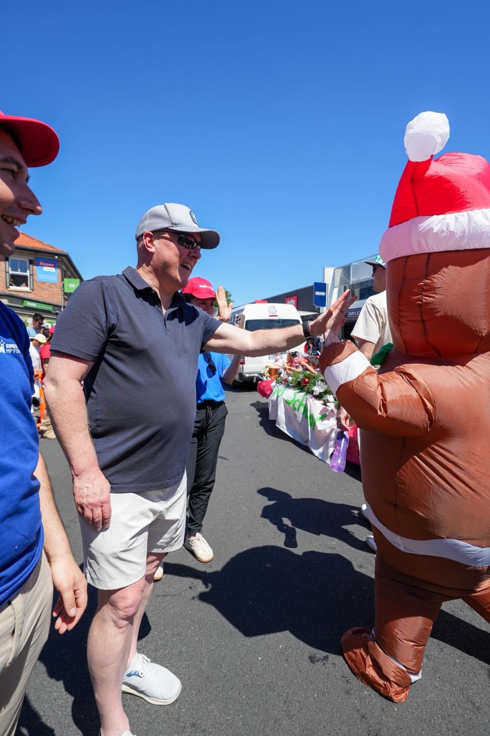 Christopher Luxon at a Santa parade. Christopher Luxon at a Santa parade.