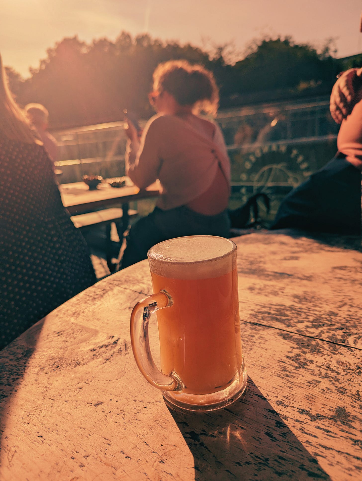Pint of beer in sepia sunshine in Left Handed Giant, Bristol from Never Lost Letters by Stuart Found
