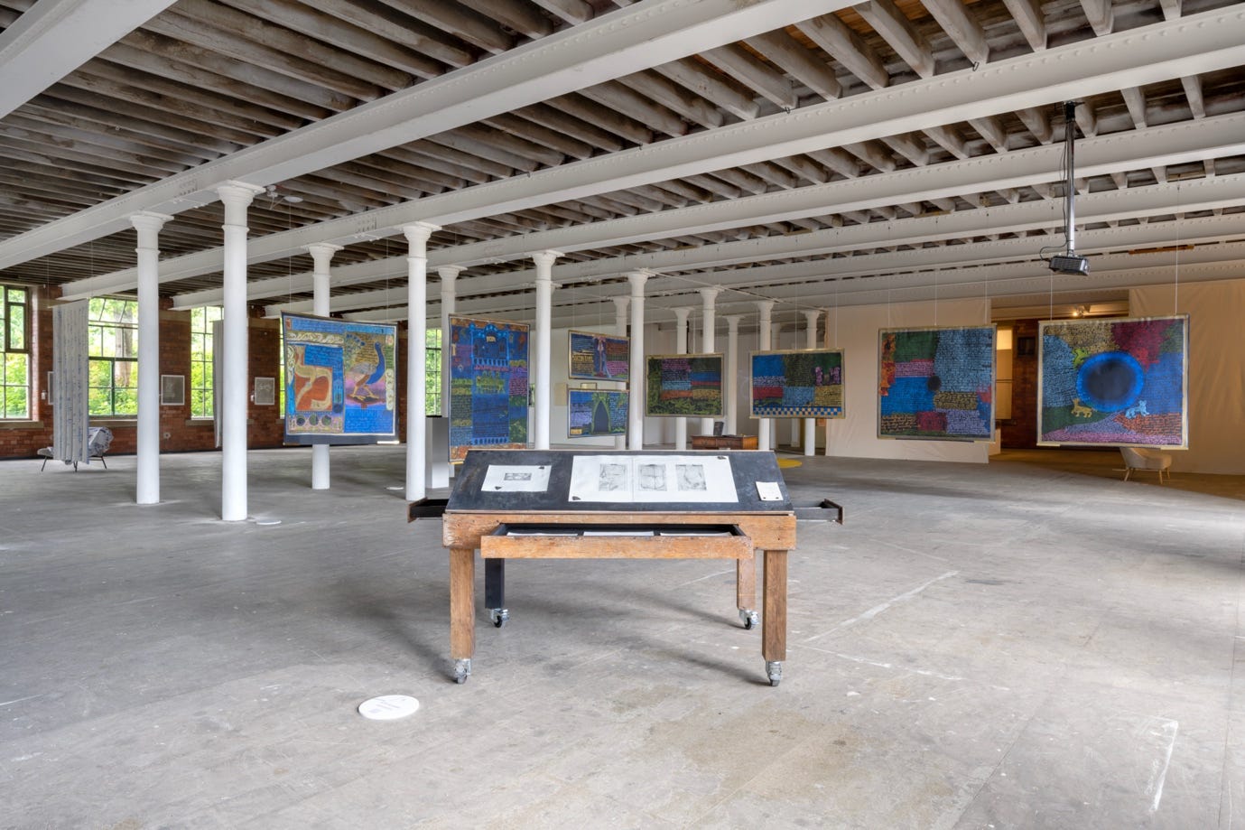 A room with a table and paintings on the ceiling

AI-generated content may be incorrect.