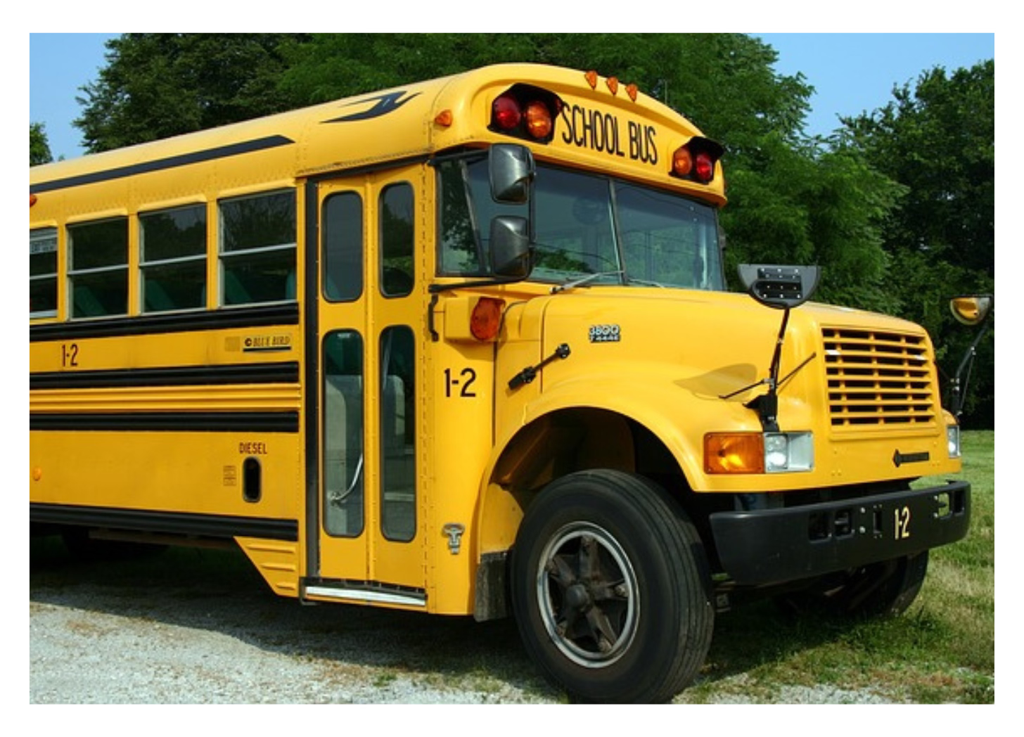 A yellow school bus from the sixties.