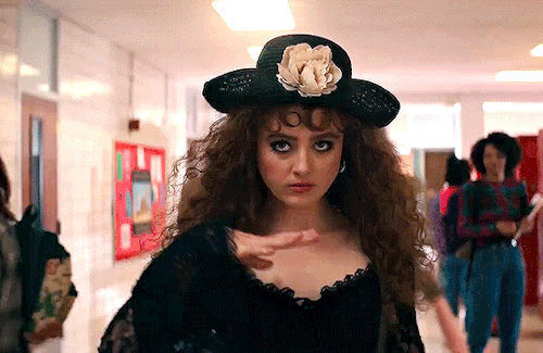 Kathryn Newton in Lisa Frankenstein wearing a black ensemble.