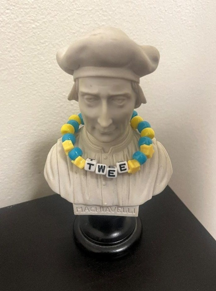 A statue of a person with a necklace

AI-generated content may be incorrect.