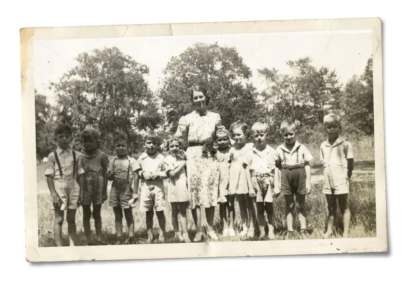 A group of children standing together

Description automatically generated