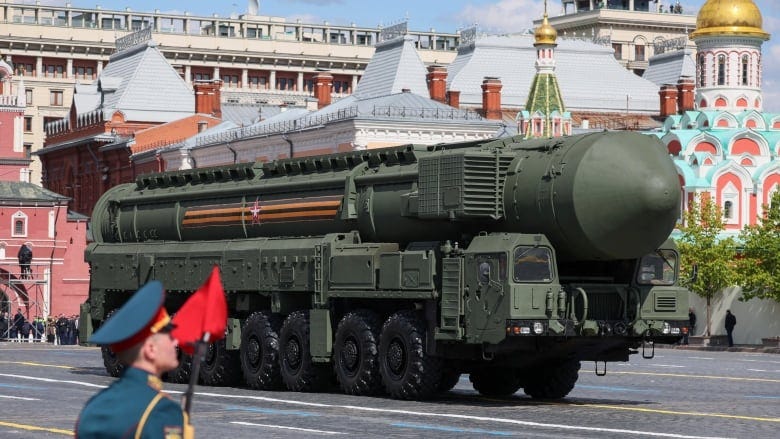 An intercontinental ballistic missile system drives moves through Moscow's Red Square during a military parade. An intercontinental ballistic missile system drives moves through Moscow's Red Square during a military parade.