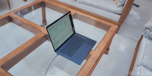 A computer on a table

Description automatically generated