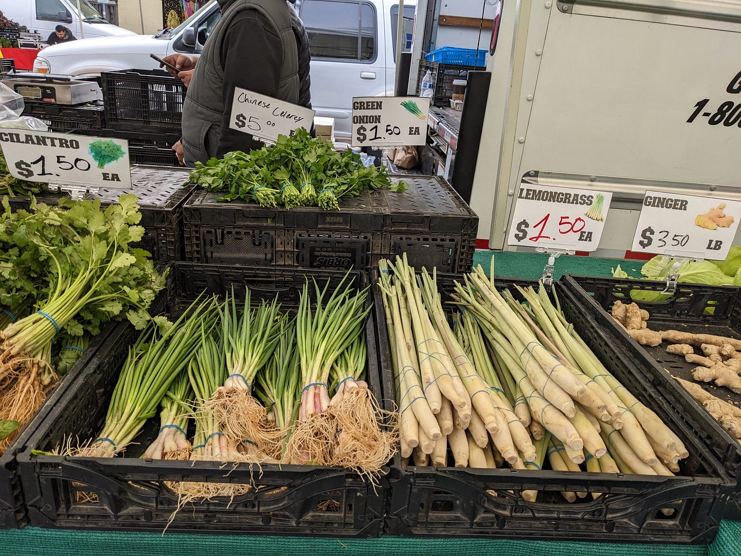 lemongrass and green onions at a market