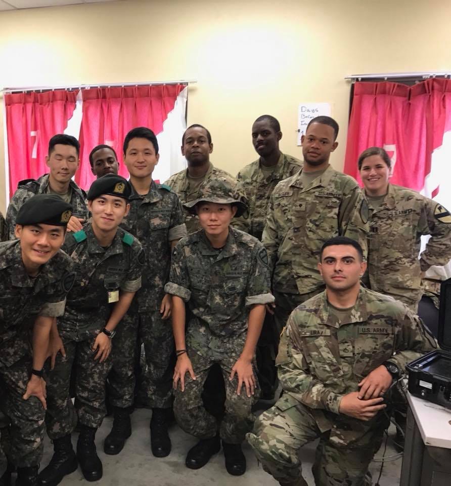 Katherine Rowe with soldiers in Korea