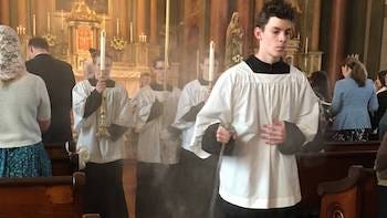 stock photos of some altar boys and a laminated altar boy response (in Latin) card