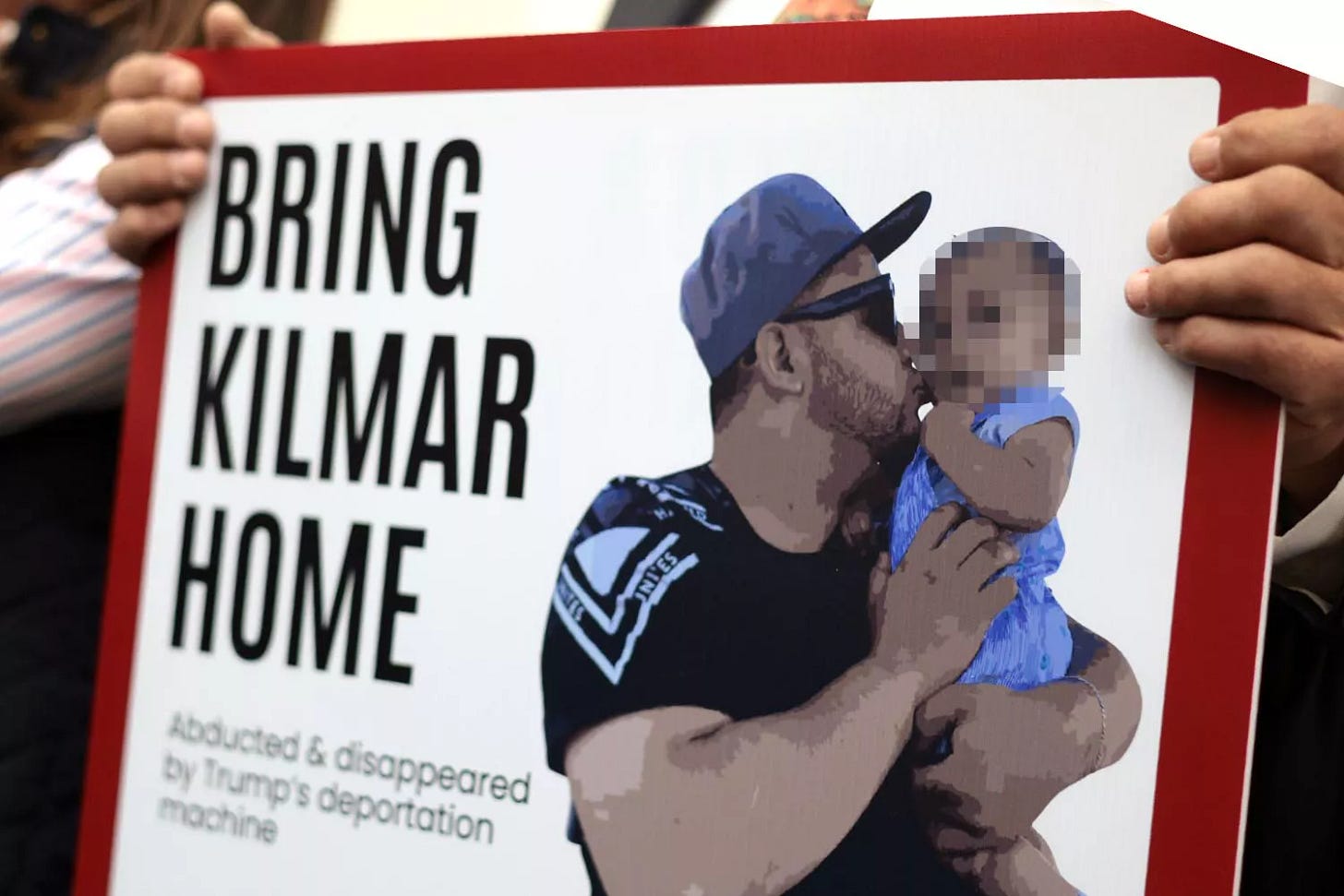 A member of the Congressional Hispanic Caucus holds a picture of Kilmar Abrego Garcia during a news conference to discuss Abrego Garcia's arrest and deportation d at Cannon House Office Building on April 9, 2025 in Washington, DC. 