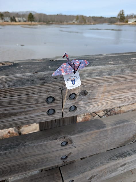 connecting the dots between yoga with Freya and giving away cranes on a stick