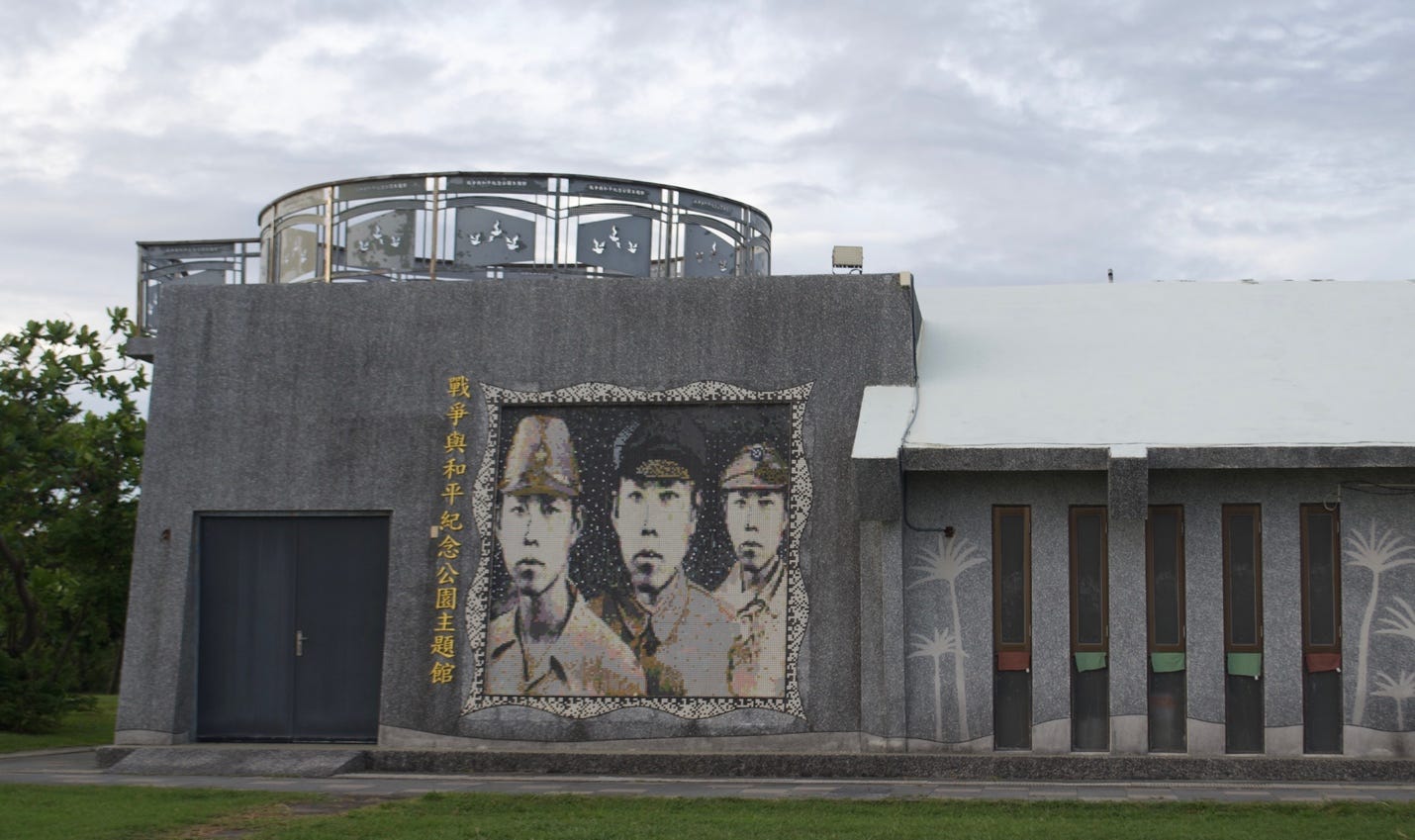 A building with a mural of three men
AI-generated content may be incorrect. A building with a mural of three men
AI-generated content may be incorrect.